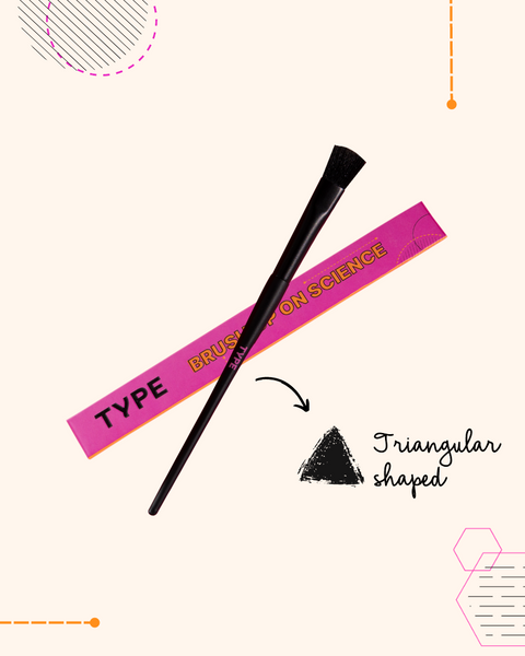 Triangular makeup brush with "Brush Up On Science" packaging.