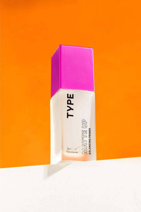 Matte Up Balancing Primer in stylish packaging against bright background.