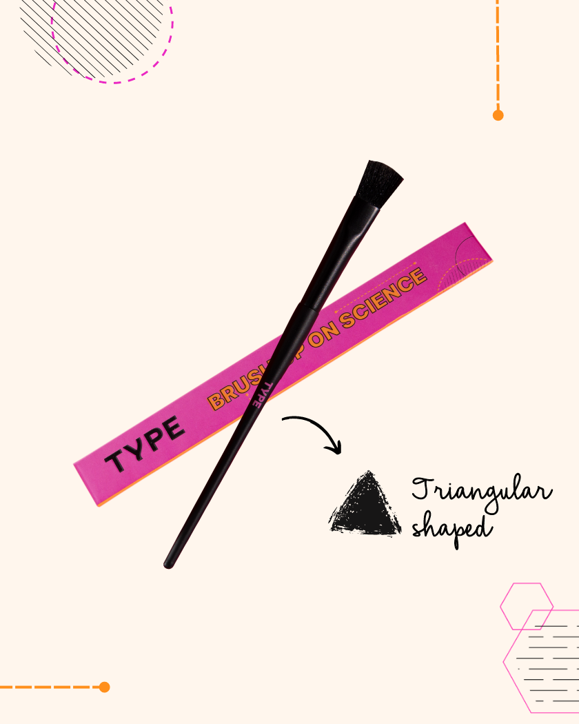 Triangular makeup brush with "Brush Up On Science" packaging.