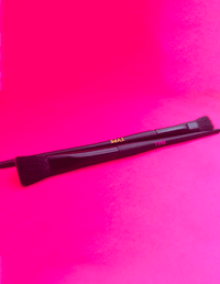 Makeup brushes on a vibrant pink background for "BRUSH UP ON SCIENCE."
