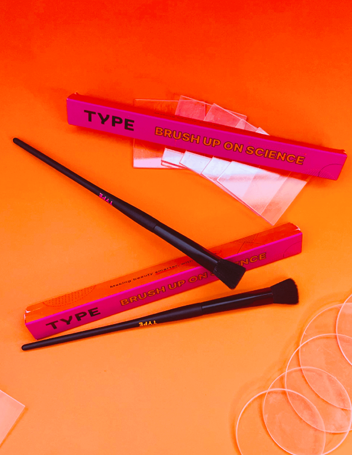 Brush Up on Science makeup brushes with packaging and tools.