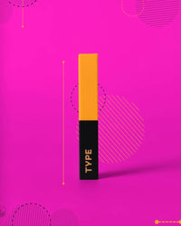 Light Up Lipstick with vibrant yellow and black packaging against pink background.
